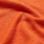 Semaine tastemaker Christiaan wears this orange linen sweater