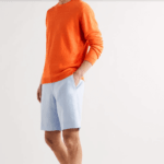Semaine tastemaker Christiaan loves to wear this orange linen sweater