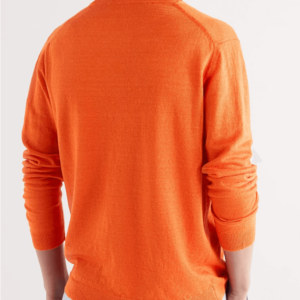 Semaine tastemaker Christiaan wears this orange linen sweater