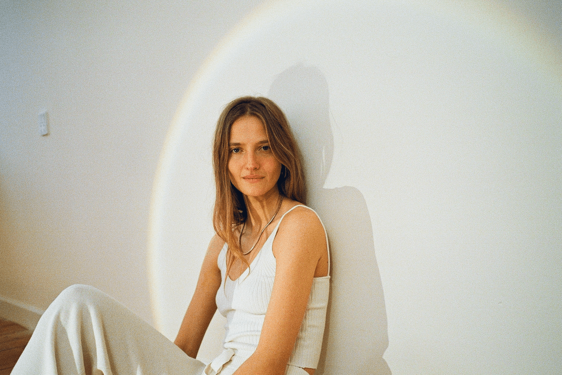 Semaine Tastemaker Amanda Norgaard sitting in a yoga pose in her Copenhagen studio