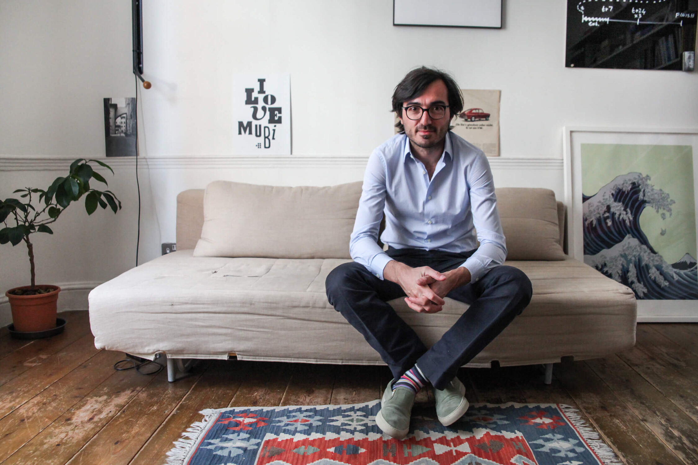 Tastemaker Efe Cakarel photographed in his London office of MUBI