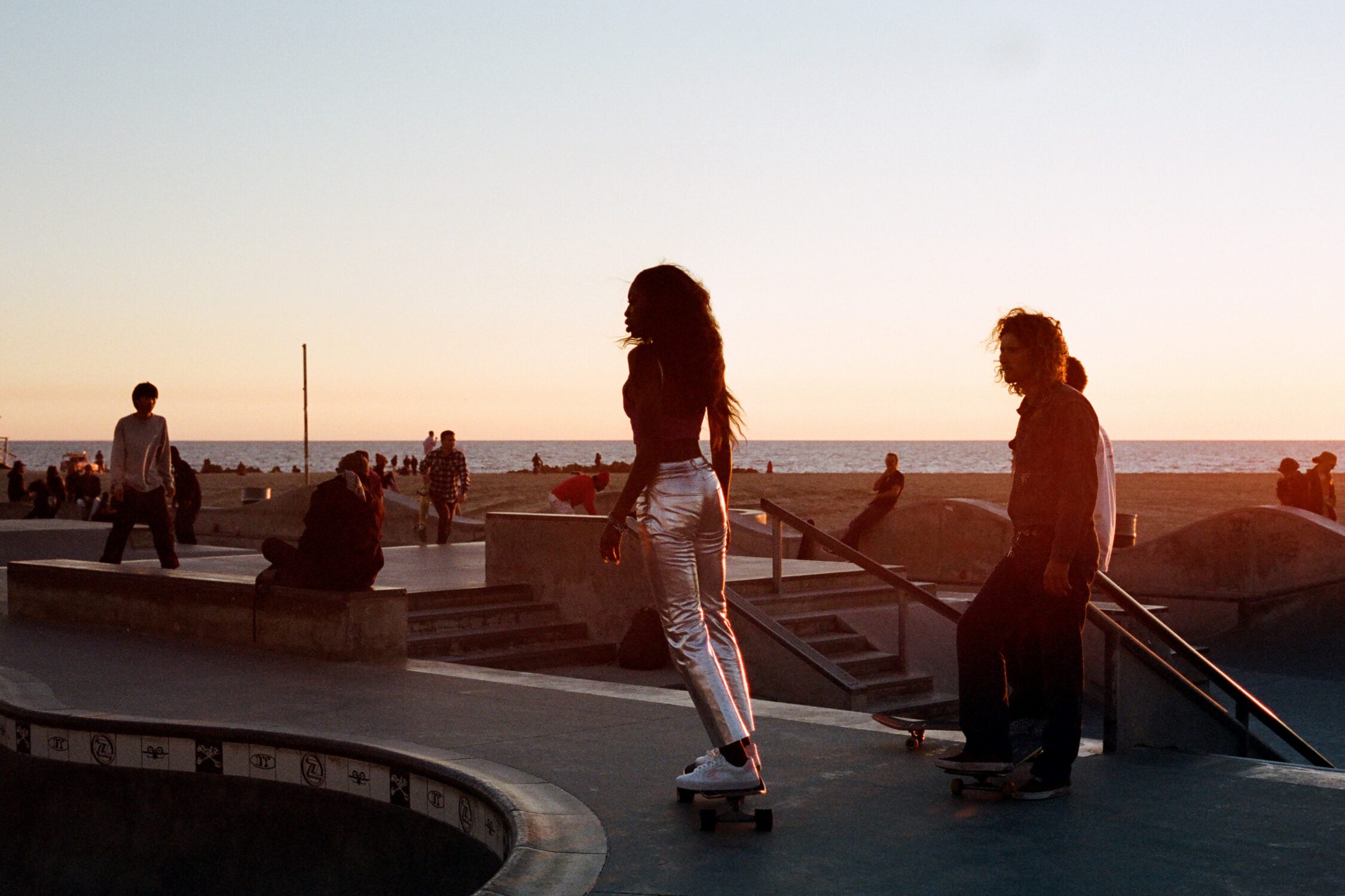 Grlswirl Skateboarder Yaya riding at sunset in the Venice Beach Skateboarding Bowl