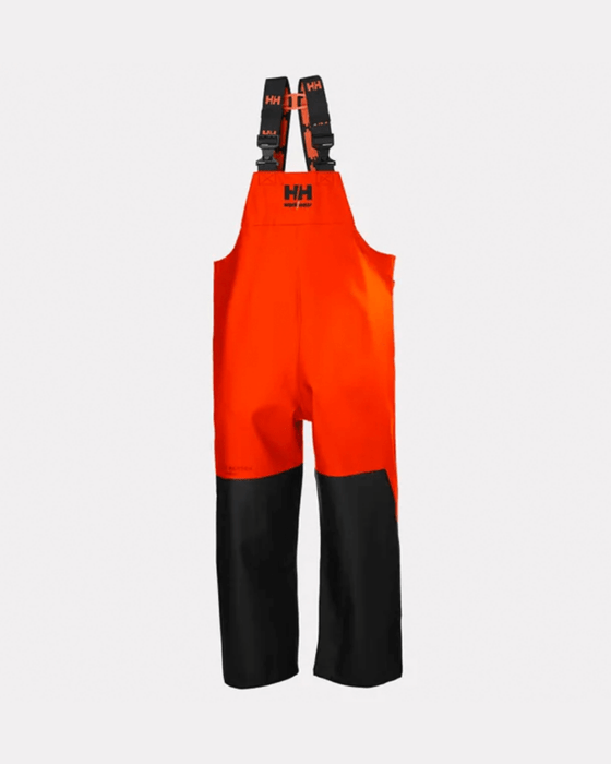 Helly Hansen Storm Waterproof Rain Bib Trousers Orange worn by Semaine Tastemaker Sky high Farm's team members.