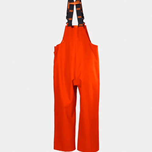 Helly Hansen Storm Waterproof Rain Bib Trousers Orange worn by Semaine Tastemaker Sky high Farm's team members.