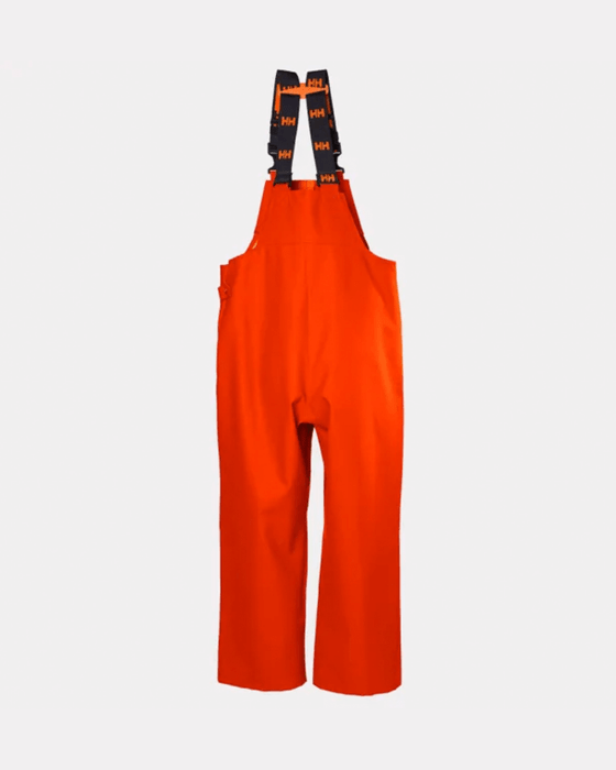 Helly Hansen Storm Waterproof Rain Bib Trousers Orange worn by Semaine Tastemaker Sky high Farm's team members.