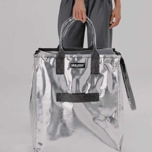 Hulken Multipurpose SIlver Tote Bag, held, chosen by Semaine Tastemaker Paris Starn.