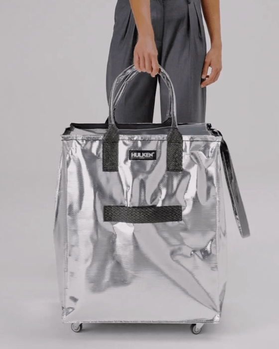 Hulken Multipurpose SIlver Tote Bag, held, chosen by Semaine Tastemaker Paris Starn.