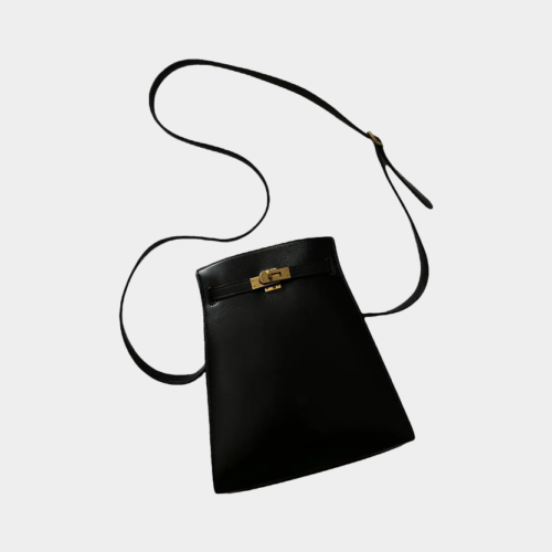 Black & Gold Kelly Sport Bag Hermès Vintage, chosen by Semaine Tastemaker Charlotte Chesnais.