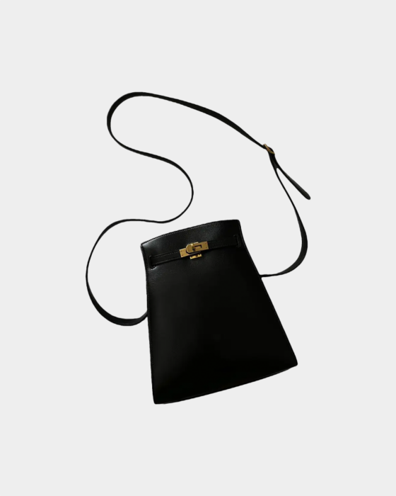 Black & Gold Kelly Sport Bag Hermès Vintage, chosen by Semaine Tastemaker Charlotte Chesnais.