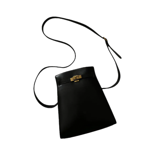 Black and Gold Kelly Sport Bag Hermès Vintage, chosen by Semaine Tastemaker Charlotte Chesnais.