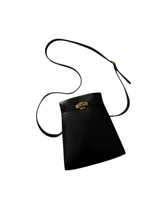 Black and Gold Kelly Sport Bag Hermès Vintage, chosen by Semaine Tastemaker Charlotte Chesnais.